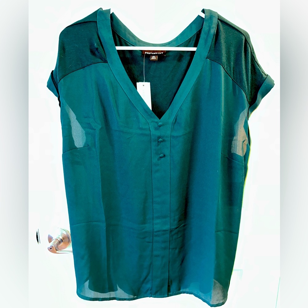Very pretty teal color.  Helina Mixed Material Blouse